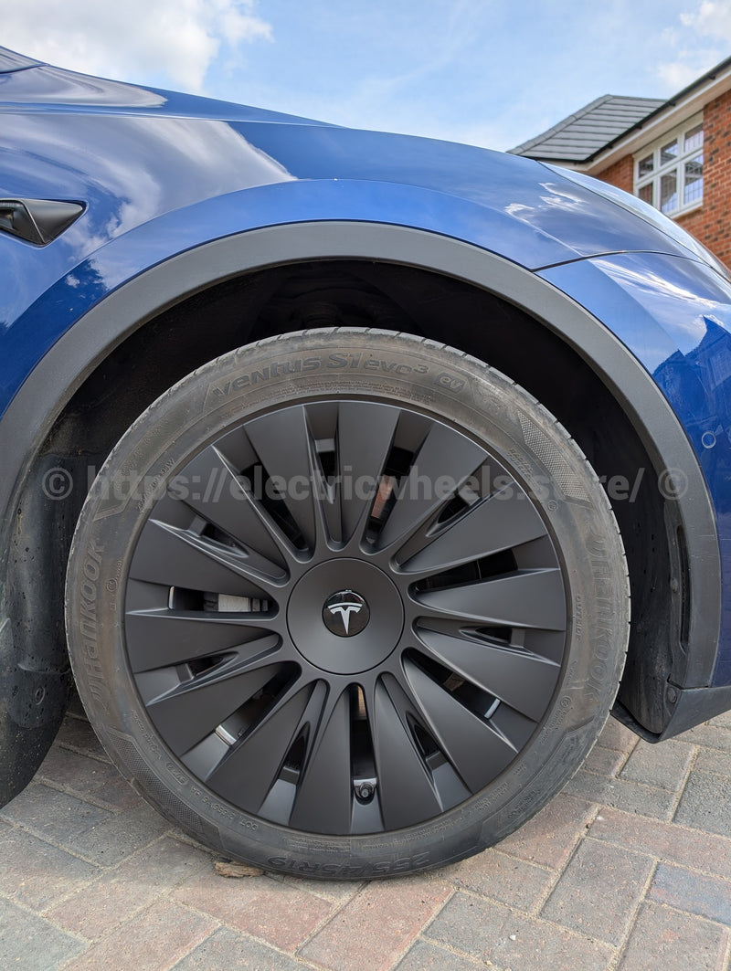 BLADE 19" Wheel Covers for Tesla Model Y (Matt Black) fitted to a Tesla Model Y Classic
